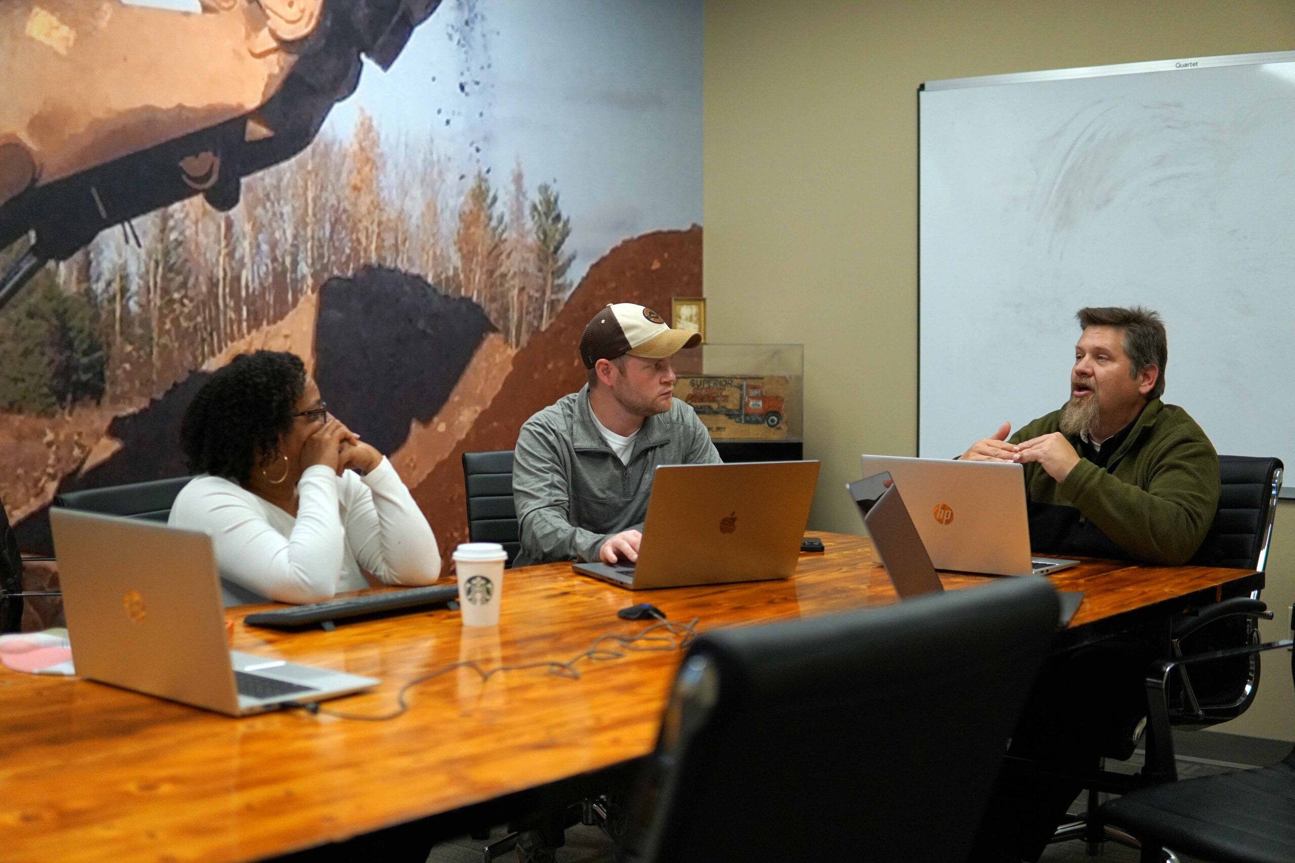 Xeratec developers working through a project together