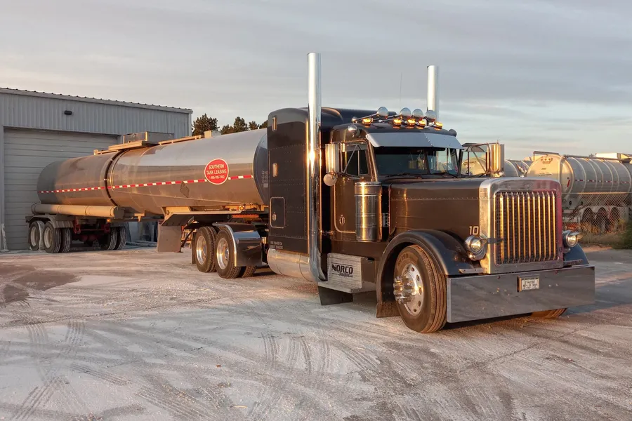 A Norco Transport tanker truck at sunrise
